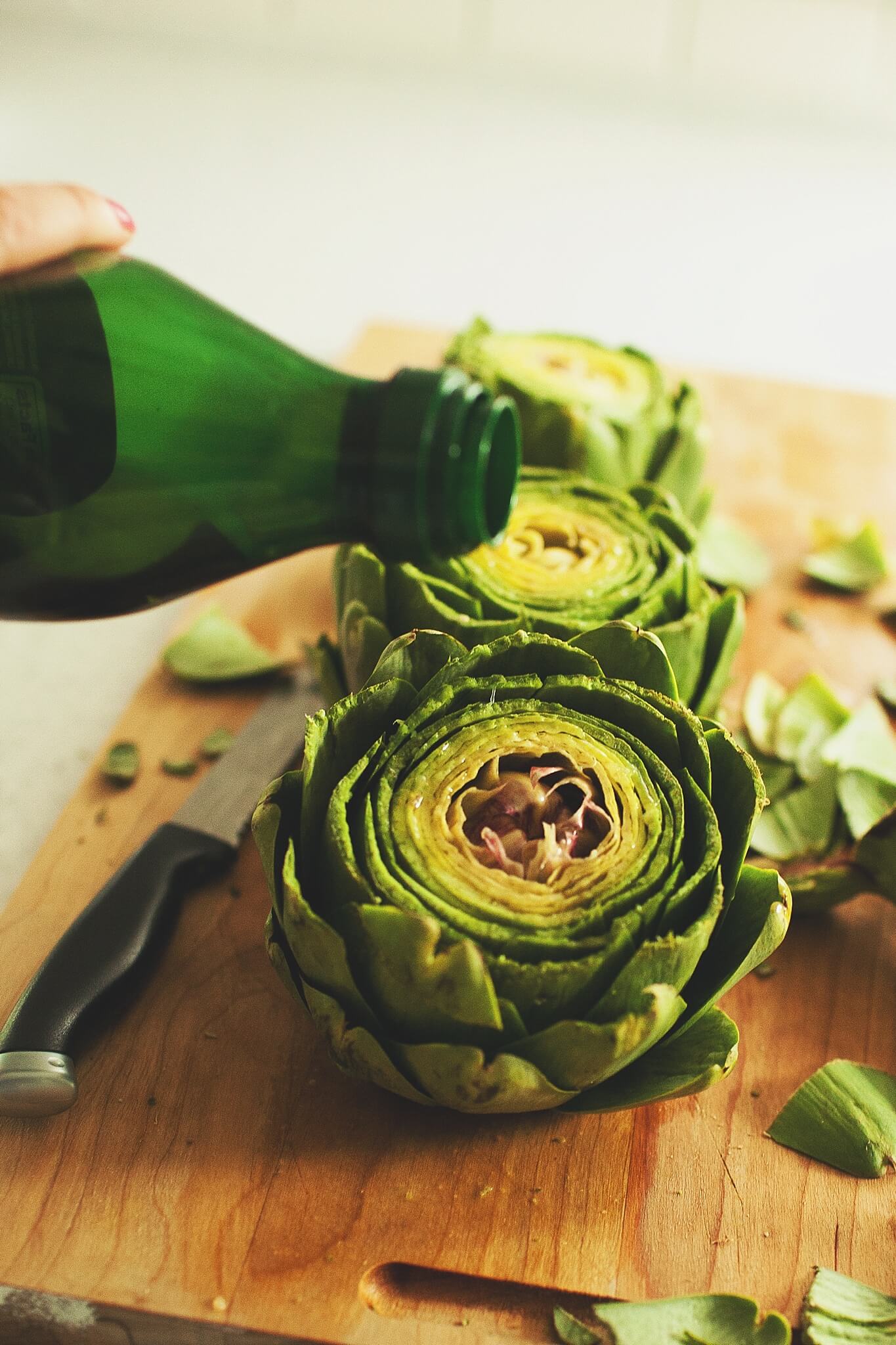 How to Cook Crockpot Artichokes - Step 7: Drizzle with olive oil