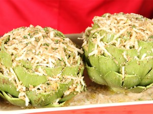 open up outer petals & put stuffing in there, as well! as choke steams the outer petals will become tender & edible.