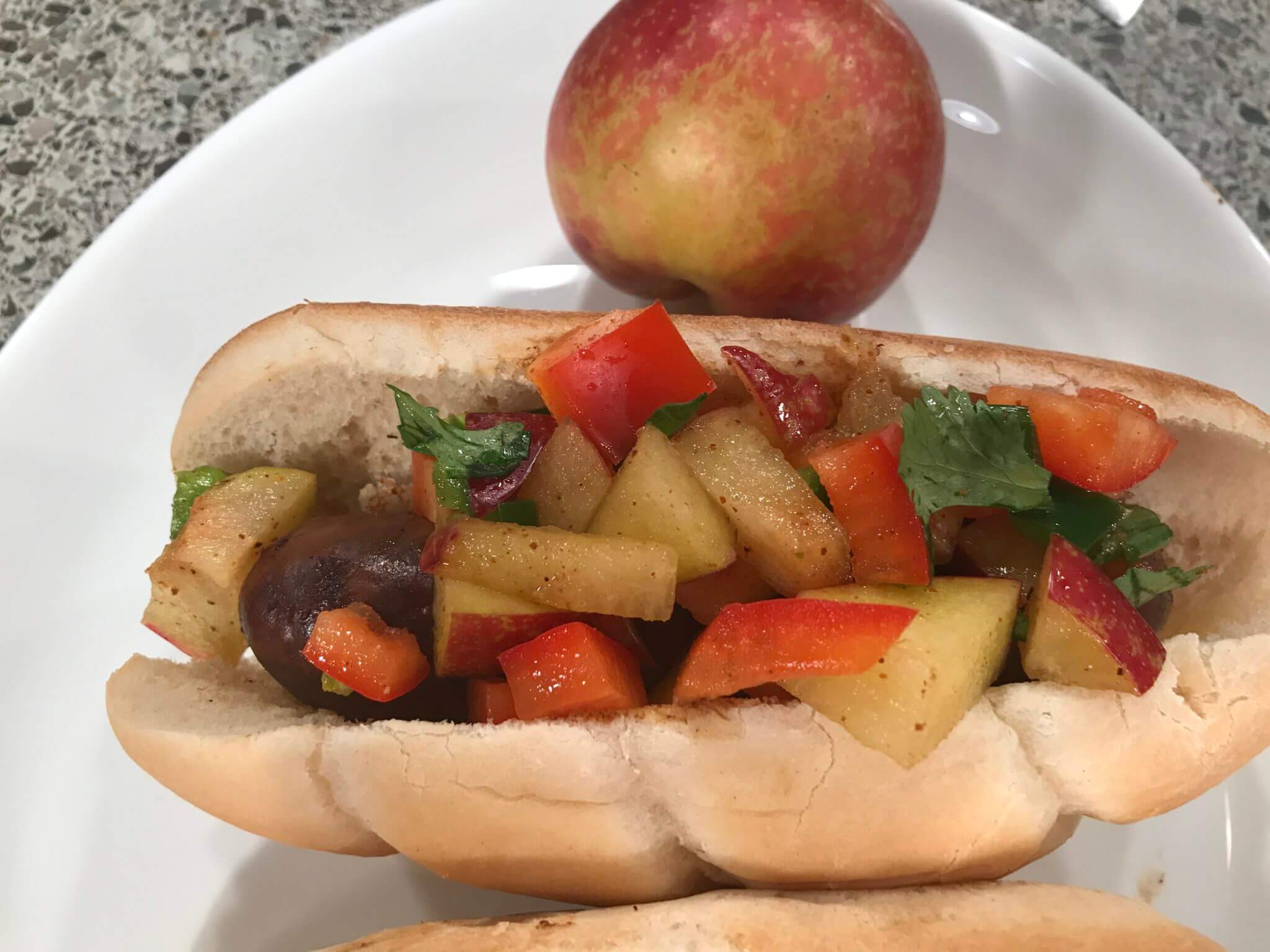 Brat with plum salsa Brat with plum salsa