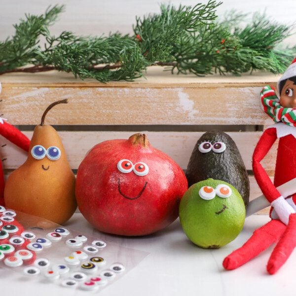 Elf on the Shelf Makes Silly Faces on Fruit