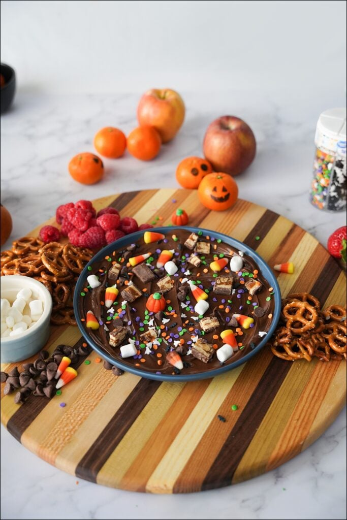 Hazelnut butter board on wooden platter with dippers