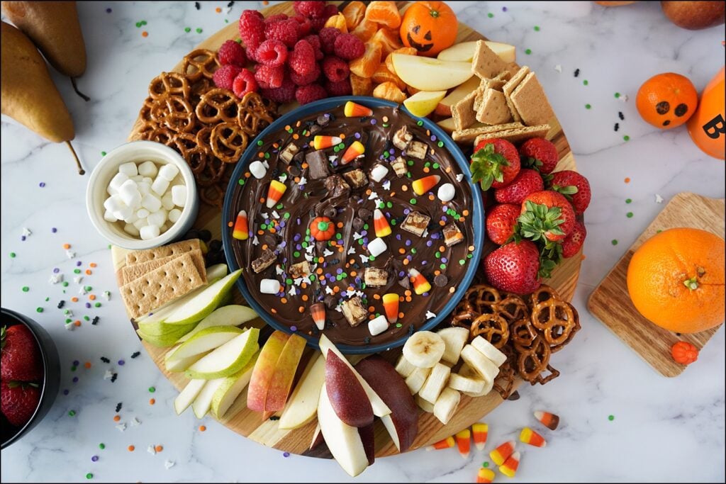 overhead view of hazelnut butter board with dippers