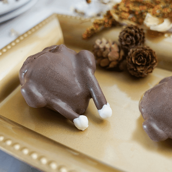 Chocolate Covered Turkey Strawberries on gold plate