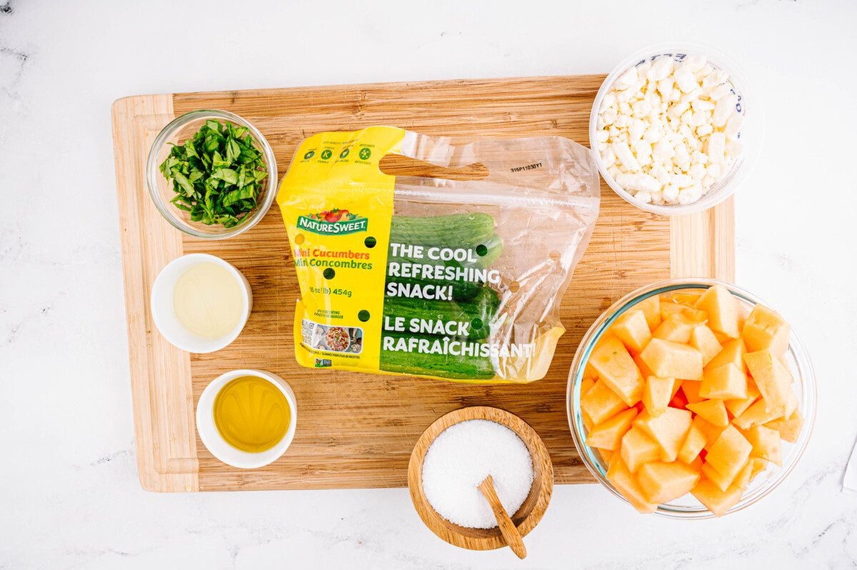 Cucumbers, cantaloupe, feta, olive oil, lemon juice, basil