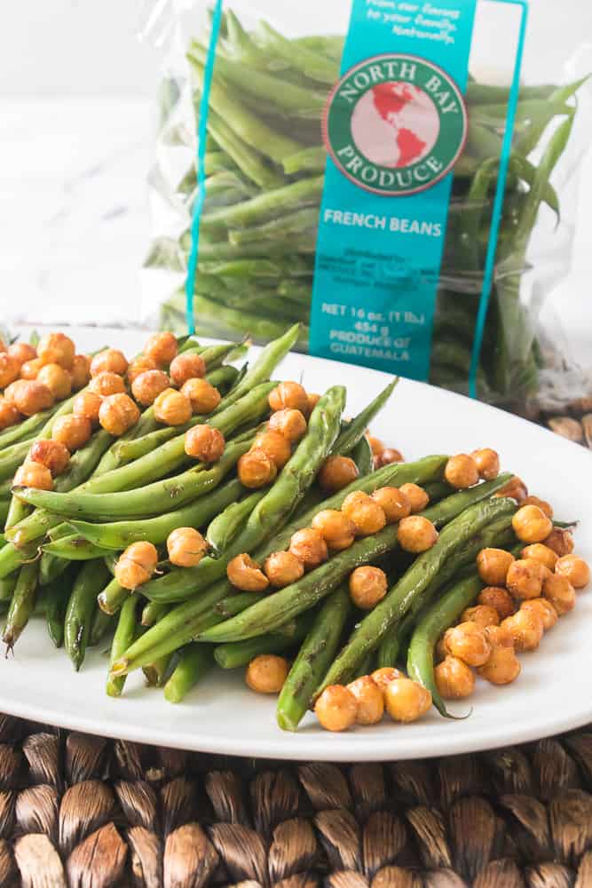 Up close shot of green beans and chick peas with North Bay Produce bag in the background