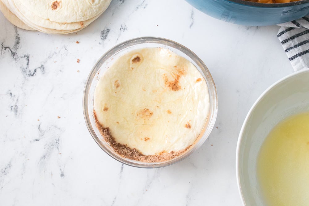 street tortilla in bowl with cinnamon and sugar