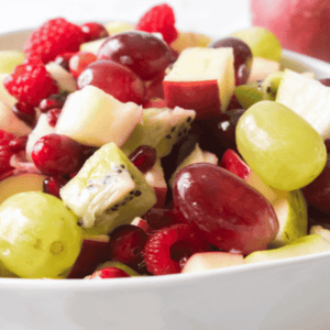 Christmas fruit salad in a white bowl