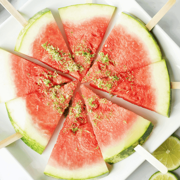 Watermelon Margarita Slices on white plate in a circle