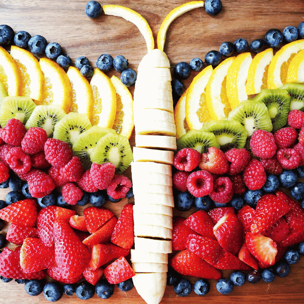 Overhead view of butterfly fruit platter