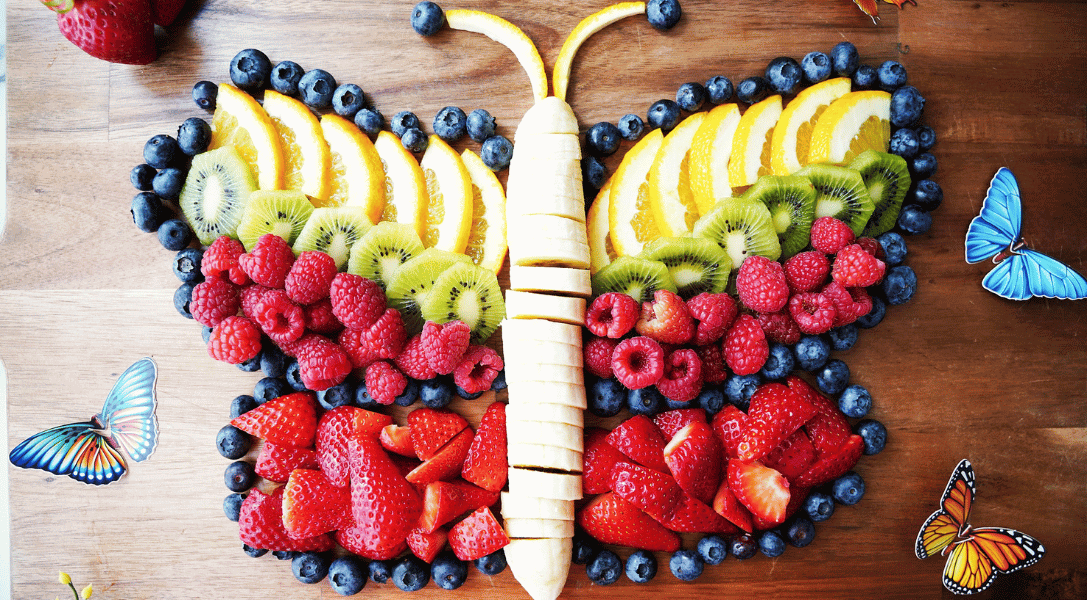 Overhead view of butterfly fruit platter