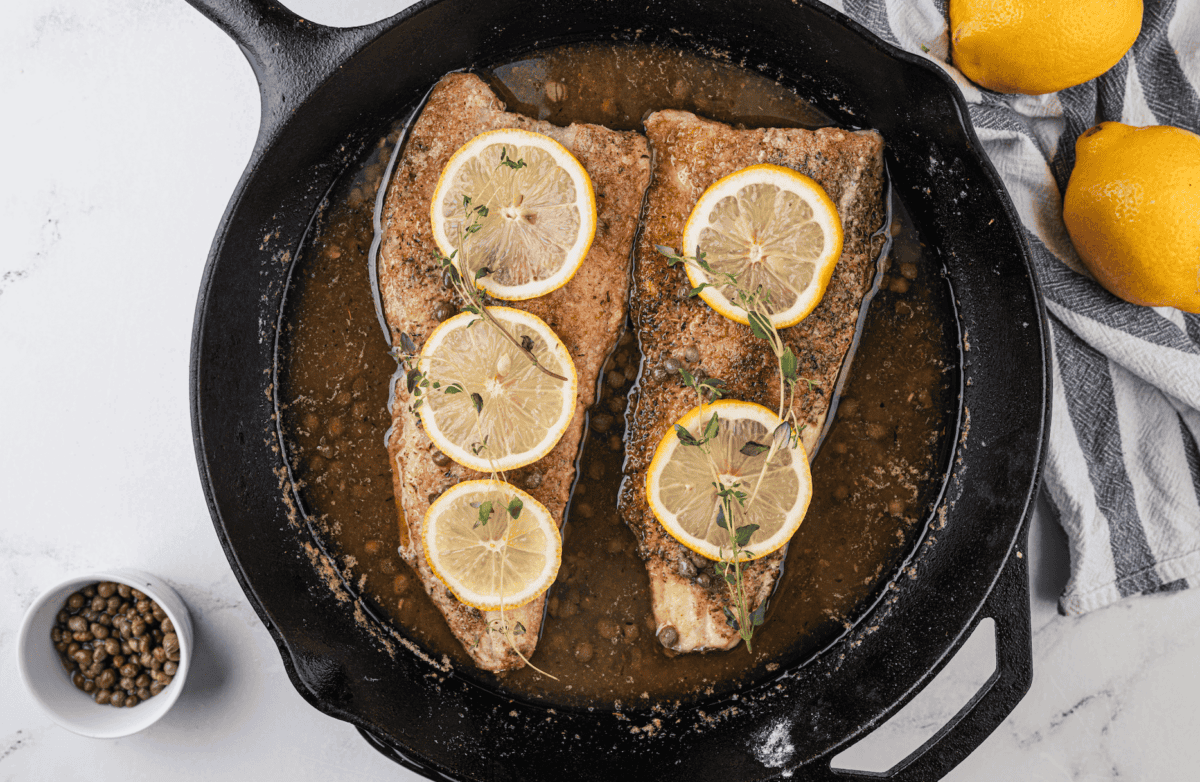 White Fish Piccata With Lemon Caper Sauce in cast iron