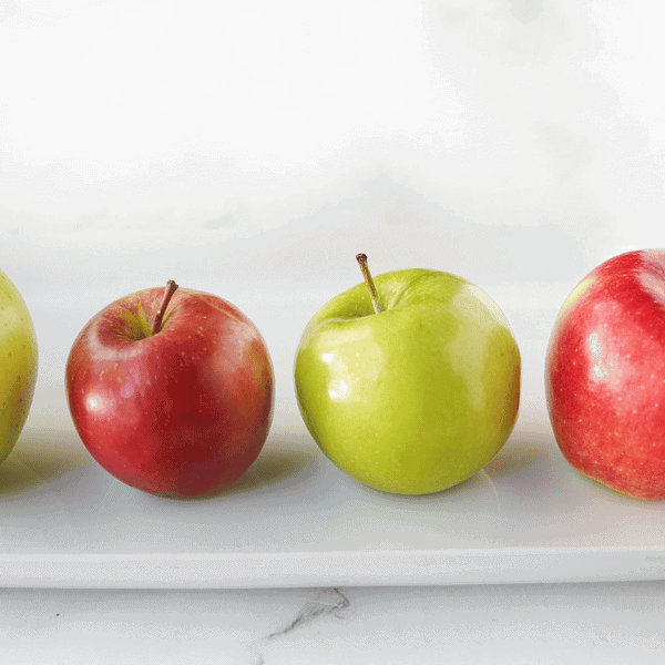 Apples on a white plate