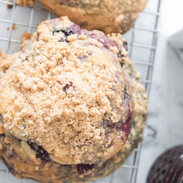 Crumbl Copycat Blueberry Muffin Cookie with blueberries in background