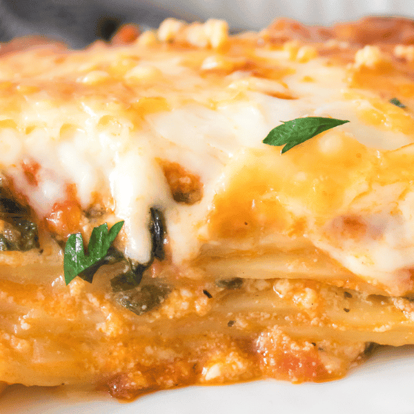 Close up of slice of spinach lasagna