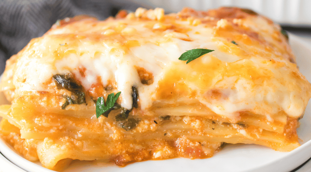 Close up of slice of spinach lasagna