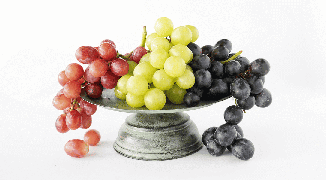 Sun World Grape Clusters on cake stand