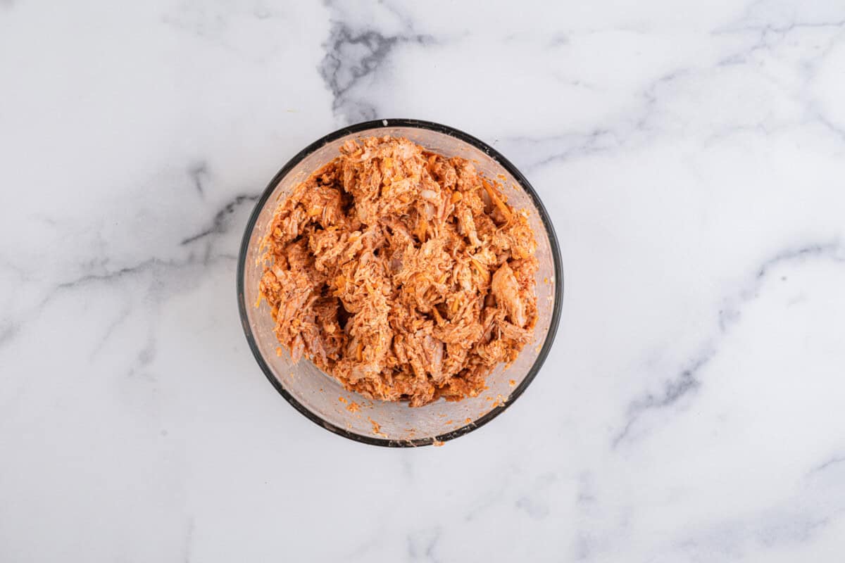 buffalo chicken filling in a mixing bowl