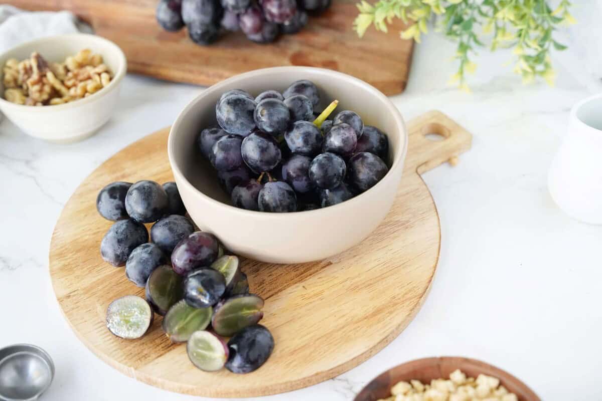 Black Grapes in white bowl