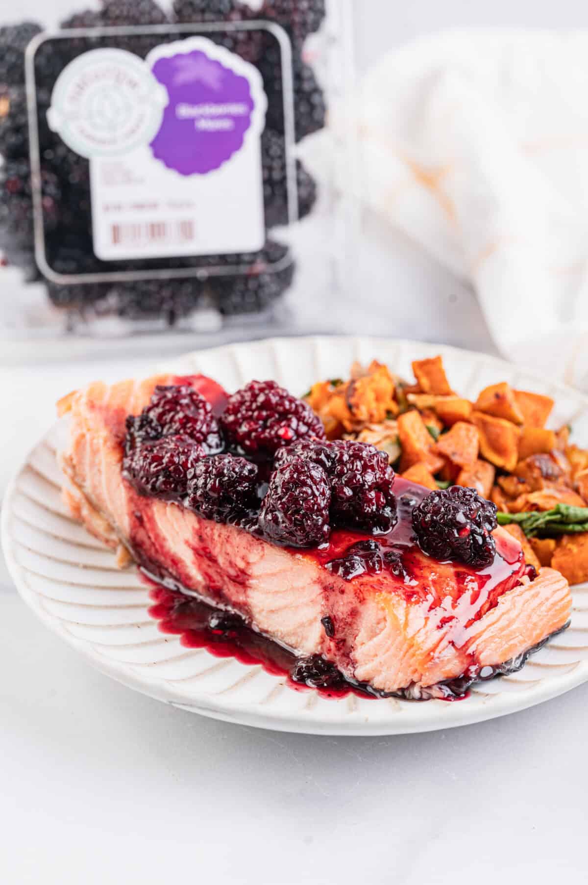 Salmon dinner with blackberry sauce